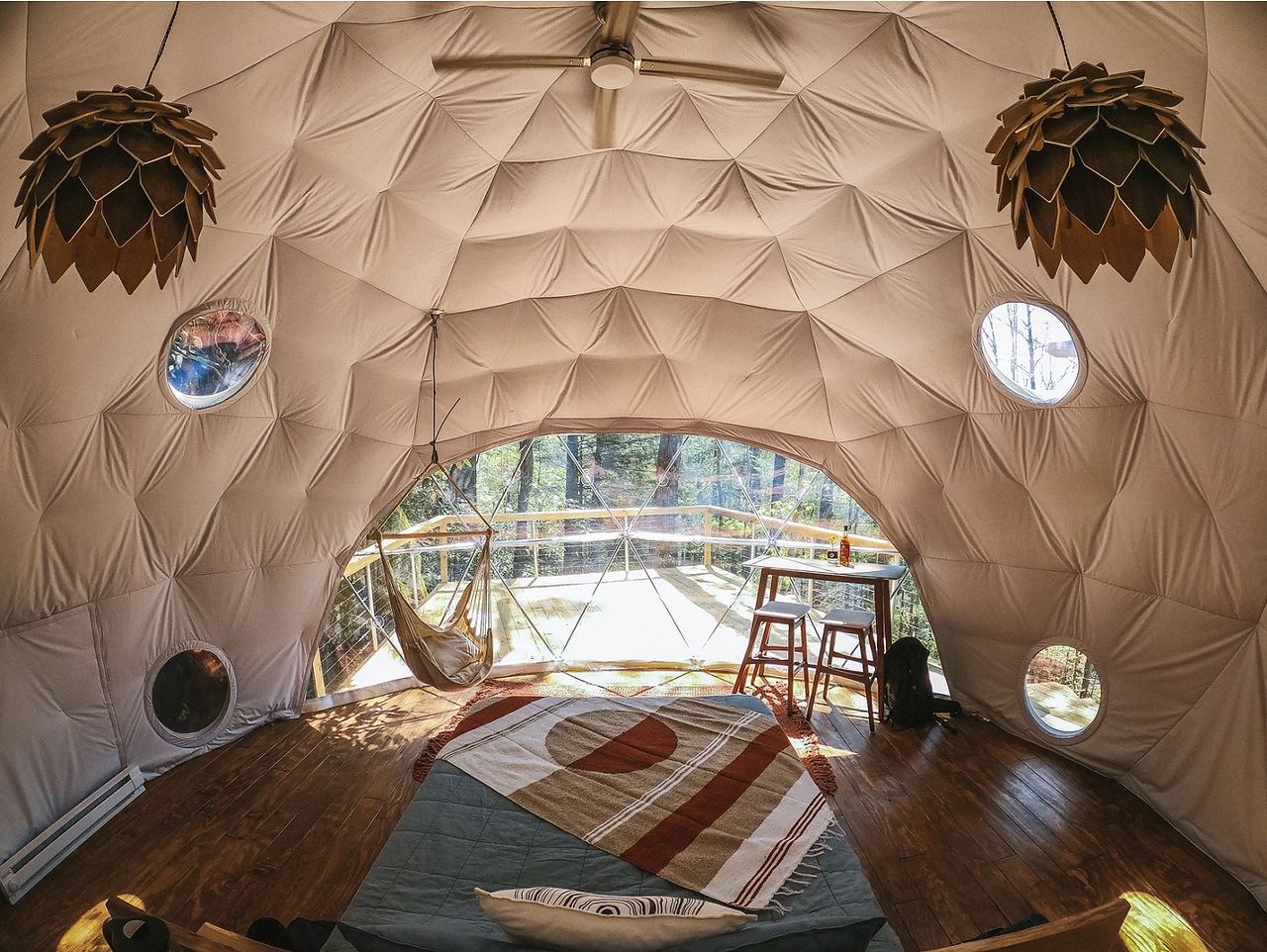 Puma Dome Treehouse
Campton, Ky.
Price Starts at $260 | Hosts 2 Guests
”Welcome to Dome Town! Dome town is a series of geodesic domes suspended in the trees. The domes are connected by suspension bridges that weave through the canopy. In total there are three sleeping domes, a giant canopy lounge net, and one communal water dome, where there are two full baths, and one wash station. Each dome offers a private and unique experience. Sleeping in a dome will change the way you think about square building forever! Dome town is located just a short walk away from The Rock House Cafe. There is no other treehouse dome experience quite like this. Explore the canopy, enjoy the gorge, sleep in a dome!” — rrgcabin.com