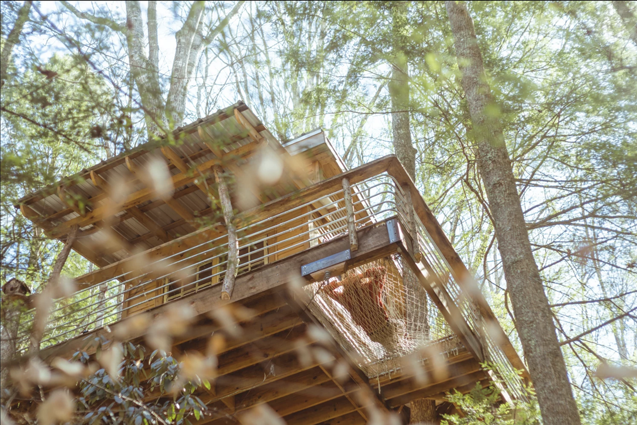 The Sylvan Float
Campton, Ky.
Price Starts at $380 | Hosts 2 Guests
”The Sylvan Float tree house is a treehouse in its purest form. Floating above the forest floor this arboreal abode is suspended between a red oak and hickory. With a full wrap around porch and cozy lofted room, the tree house is designed for two. Great views, fully enclosed room with heat, and a gas stove allow you to relax and feel at home after a day of exploring the gorge. Located five minutes from the martins fork trail head, spectacular hiking and climbing is not far after you leave the canopy and step onto the forest floor. Waking up in the tree tops has a magical effect you have to experience for yourself!” — rrgcabin.com