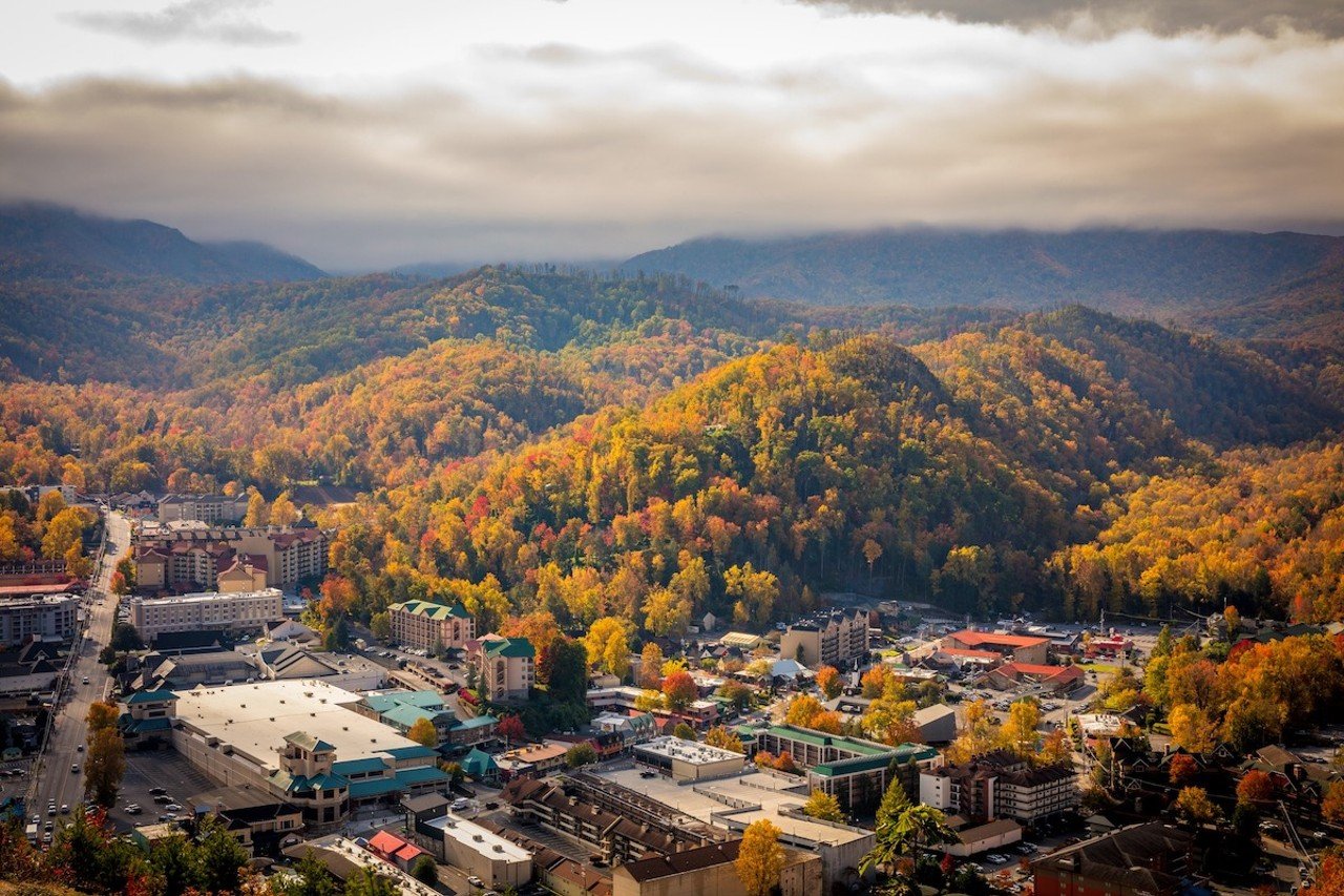 Gatlinburg, Tennessee
Distance: 4 hours and 40 minutes 
Gatlinburg is the mecca of tourism for Midwesterners because it has almost everything you could want for a fun vacation with the family or a getaway with friends, especially in the fall. The city is the gateway to Great Smoky Mountains National Park, so you can hike to see the changing leaves, go horseback riding or even go whitewater rafting. In town, you can keep yourself entertained for days at Ripley’s Believe It Or Not!, adventure park Anakeesta and numerous other attractions like Hillbilly Golf and mini golf, arcades and mirror mazes. You can also get a bird’s eye view of the mountains and take a ride on the Ober Mountain Aerial Tramway. Note: Gatlinburg was not heavily impacted by Hurricane Helene and is open to tourists.