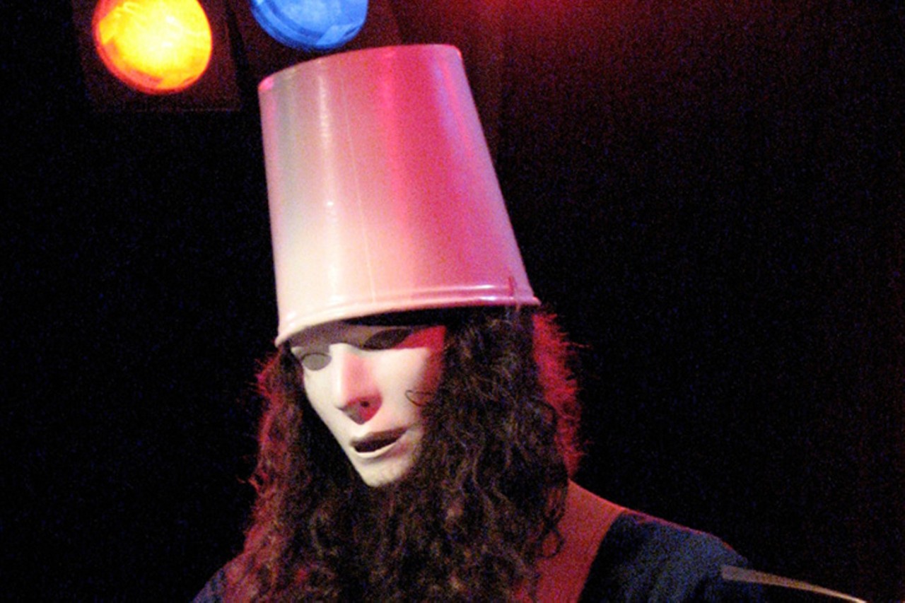FRIDAY 17
MUSIC: Buckethead
Talk about truth in advertising: When Brian Patrick Carroll was 19 and already an accomplished guitarist, he stuck a Kentucky Fried Chicken tub on his noggin, slapped an emotionless white mask over his face to shield his identity, looked in a mirror and said, &#147;Buckethead.&#148; Thus was born one of the most inventive and uniquely talented guitar shredders, a player who routinely shifts between Funk, Metal, Prog, Blues, Ambient, Bluegrass and experimental Art Rock and has been cited by numerous publications and august organizations as among the best, fastest and weirdest guitarists on the planet. 7 p.m. Friday. $25. Bogart's, 2621 Vine St., Corryville, bogarts.com.
Photo: Jhayne