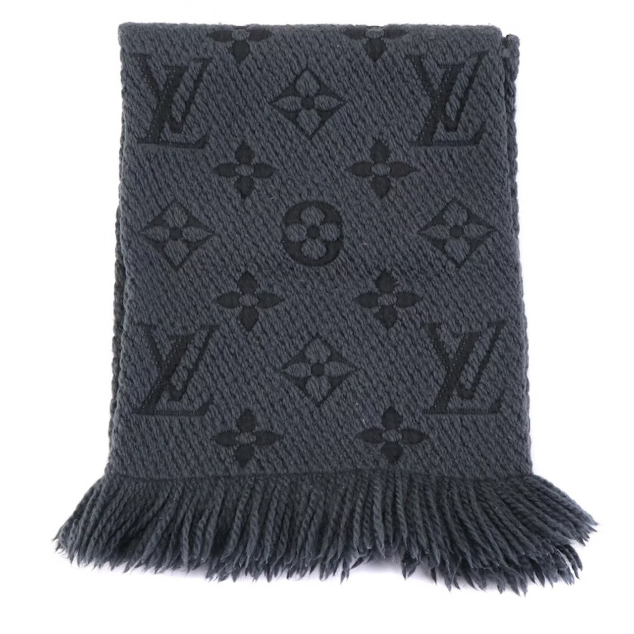 Louis Vuitton Logomania Scarf in Grey and Black Knit Jacquard
Jingle ball on a budget! This Louis Vuitton scarf is simple enough to go with any coat while still making a treat-yo-self statement. Lean into the secondhand-ness of the gift by wrapping it in newspaper, just be sure to include the EBTH receipt so they know it’s 100% authentic.