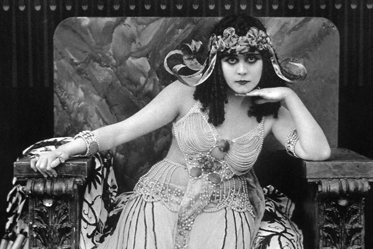 Theda Bara
Called the original vamp, Theda Bara was a popular stage and silent film-era actress. Born in 1885 in Avondale, Bara attended Walnut Hills High School before going to New York City to become an actress. Her career took off after she starred as a vampiric seductress in the film A Fool There Was. Bara starred in over 40 films between 1915 and 1919, but her career cooled after tastes changed and movies started casting more “wholesome” actresses. Still, Bara’s dark, alluring look and status as an early sex symbol of cinema give her an enduring legacy.