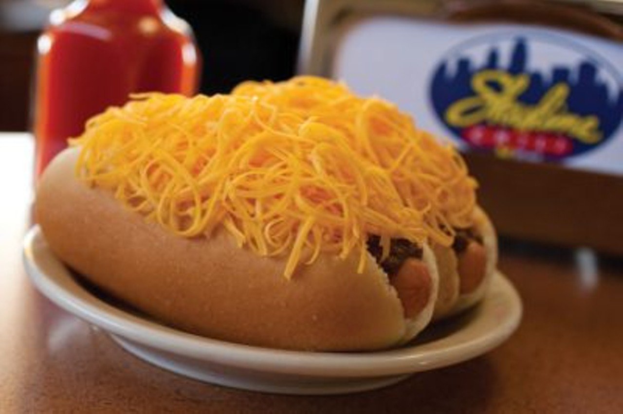 Skyline Chili 3-Way
Multiple Locations
The history of Cincinnati-style chili goes back to the 1920s, when it was invented by Greek immigrants who used Mediterranean-inspired spices to create a meat sauce used initially to top hot dogs sold out of a cart. The beef-based sauce &#151; it&#146;s kind of like a runny pasta sauce with hints of cinnamon, chocolate and other spices &#151; eventually became the key ingredient in the 3-way, a plate of pasta topped with chili, an unnecessary amount of shredded cheddar cheese and a side of oyster crackers. Adding onions to the 3-way makes it a 4-way; onions and beans make a 5-way. Local chain Skyline Chili was founded by Greek immigrant Nicholas Lambrinides in 1949, inspired by his mother's family recipes from their hometown of Kastoria, Greece. In an eternal regional chili war, locals are divided over whether Skyline has the best chili and the other popular local chain, Gold Star, is for losers, or if it&#146;s the other way around. You&#146;ll find die-hard supporters of both. But if you want to go non-chain, there are more than 250 chili parlors in Cincinnati &#151; restaurants big and small offering their own take on this regional favorite. Most people, however, start with Skyline.
Photo via Facebook.com/SkylineChili