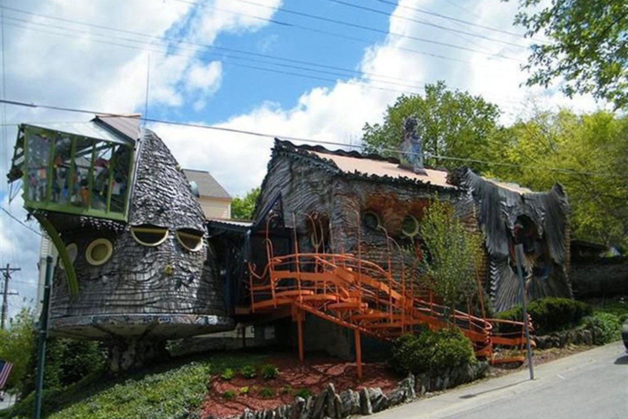 The Mushroom House
3331 Erie Ave., Hyde Park
Architect Terry Brown was a University of Cincinnati professor of architecture and interior design, but to most in our region he&#146;s known as the guy behind Hyde Park&#146;s famed "Mushroom House." Guests at street level will notice a winding entry staircase and a misshapen exterior constructed of metal, glass, ceramic and warped wood shingles, suggesting a fairy tale or bizarre, otherworld-esue appearance that looks like a very large mushroom. The one-bedroom, one-bath, 1,260-square-foot structure was built by Brown from 1992 to 2006, and served as his second residence until his death in 2008.
Photo via Zillow listing