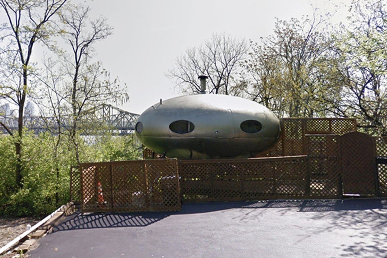 The Spaceship House
222 Wright St., Covington
In the late 1960s and early 1970s, Finnish architect Matti Suuronen designed less than 100 Futuro houses, or flying saucer-esue homes &#151; and Covington has one of them. It was purchased in 1973 by Rob Detzel, who first saw it in an issue of Family Circle. He made arrangements for its display at a home and garden show, then took it on a tour of sorts; in 1987, it landed (er, it was delivered) to its current location. The community embraces its presence and the Futuro House has even been included in a mural titled "Love the Cov" by Jarrod Becker, on the wall at Kroger&#146;s Covington location. In 2013, Covington's Mayor Sherry Carran declared Nov. 2 &#151; the 40th anniversary to its purchase by Detzel &#151; "Futuro House Day," officially naming the property it is on "Area 89." Note: This is a private residence.
Photo via Google Street View