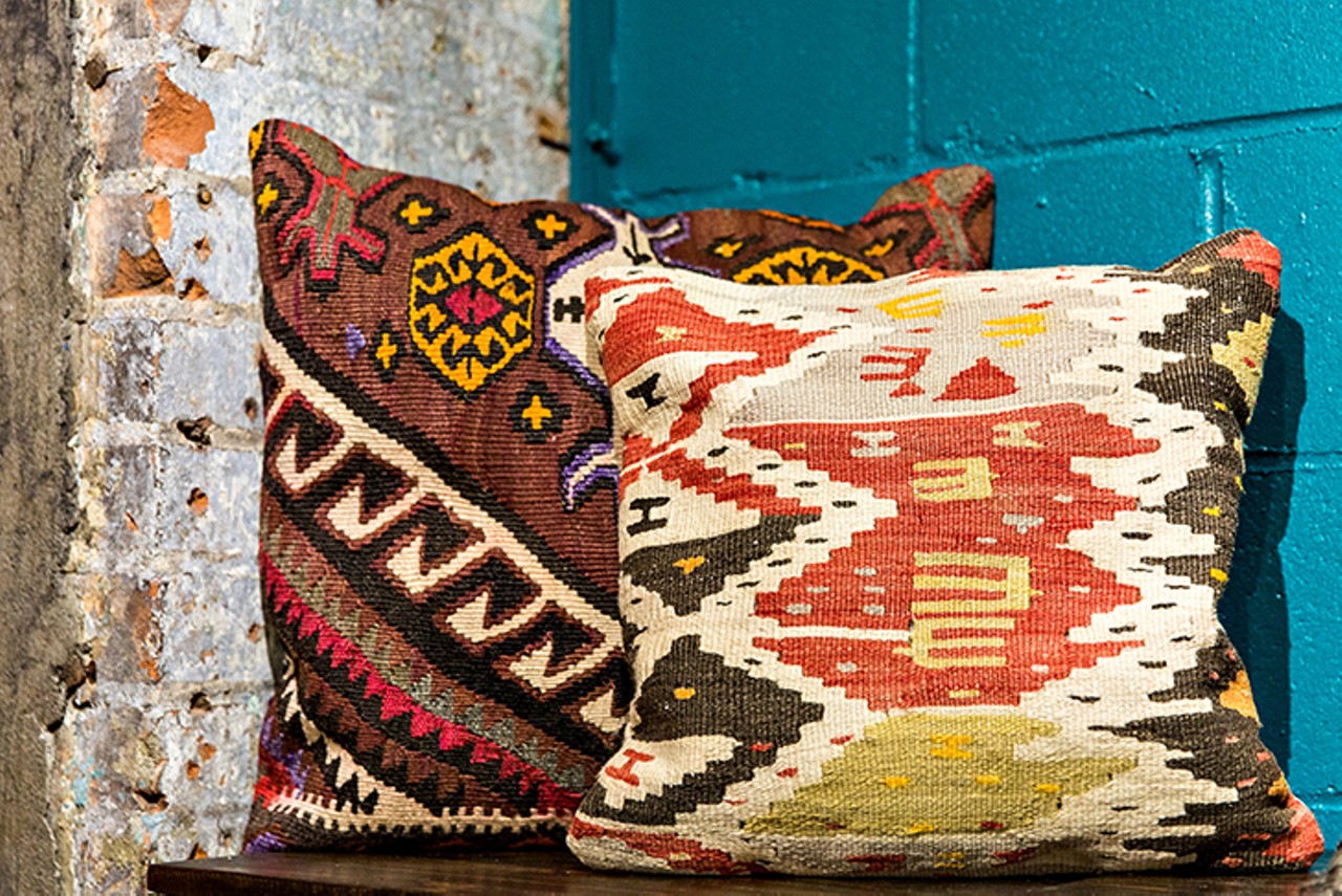 I is for an interesting kilim wool pillow. $60-$72, Little Mahatma, 1205 Vine St., Over-the-Rhine, searchable on Facebook.