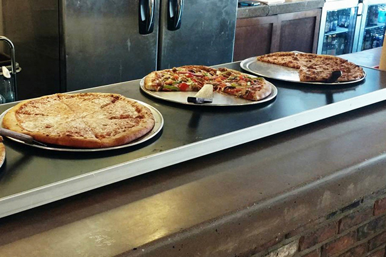 Lucy Blue Pizza
1126 Main St., Downtown
Food available 11 a.m.-2 a.m. Thursday; 11 a.m.-3 a.m. Friday and Saturday
Lucy's started as an OTR walk-up pizza window in 2001, serving pizza until 4 a.m. When you are this good at one thing, you don&#146;t need to clutter up the menu with a bunch of other fluff. Serving righteous pizza with chewy dough, full-flavored sauce and plenty of cheese, has landed this Cincinnati favorite on more than one &#147;Best of the City&#148; list. Pick your poison &#151; Marguerite, pepperoni and sausage, barbecue chicken, Thai chicken, Greek (olive oil, garlic, spinach, olives, feta, mozzarella, roma tomatoes), mushroom, veggie, supreme, Hawaiian, blanco quatro fromaggia, BLT (ranch dressing, bacon and mozzarella and topped with tomato and lettuce) &#151; they all rock. Oh yeah, and they have plain cheese, too. 
Photo via Facebook.com/LucyBluePizza