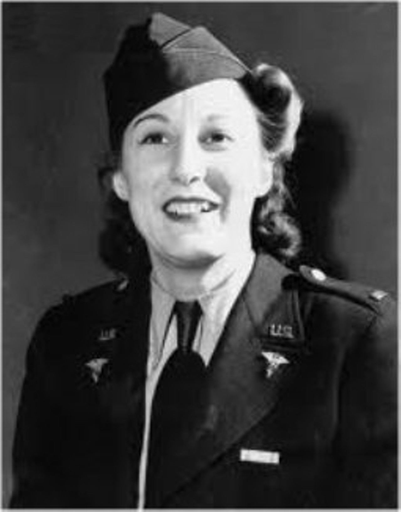 A Ft. Thomas native was the first woman to earn both a Purple Heart and Bronze Star
Cordelia E. Cook served in the U.S. Army during World War II and was the first woman to earn both a Bronze Star and a Purple Heart. Born on St. Patrick’s Day in 1919 in Ft. Thomas, Cook studied at The Christ Hospital School of Nursing. After graduating in 1940, Cook joined the U.S. Army Nurse Corps as a surgical nurse, where she earned the rank of first lieutenant. She was sent to Europe during World War II where she often found herself on the front lines in field hospitals. She was awarded a Bronze Star for her efforts and bravery working at a field hospital on the Italian front and was also given a Purple Star after she completed her hospital work while her field hospital was being shelled by German artillery and she was injured.