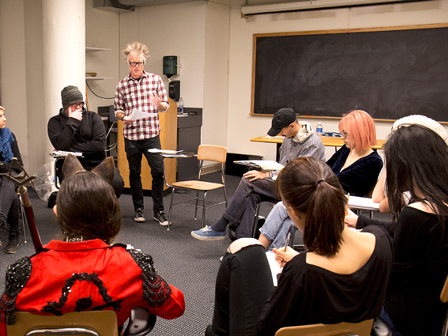 Matt Hart, standing, believes art students need to write well to articulate their vision.