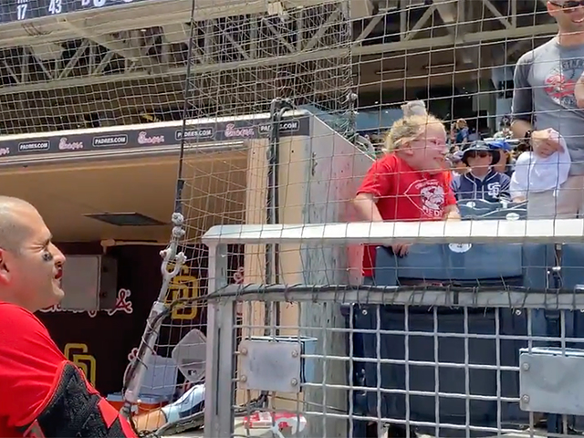 Joey Votto meets his No. 1 fan Abigail at Petco Park in San Diego.