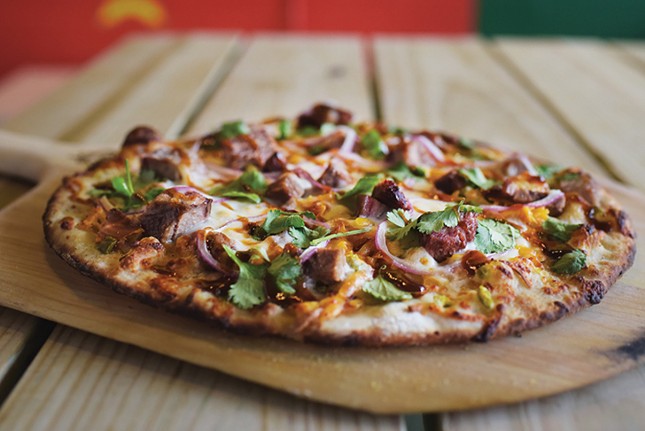 The Gruff
    129 E. Second St., Covington 
    12? Smoked Brisket Pizza: Olive oil, smoked brisket, pickled jalape&ntilde;os, red onion, smoked cheddar, mozzarella, drizzled with cilantro sauce and smoky barbecue sauce
    Photo: Provided