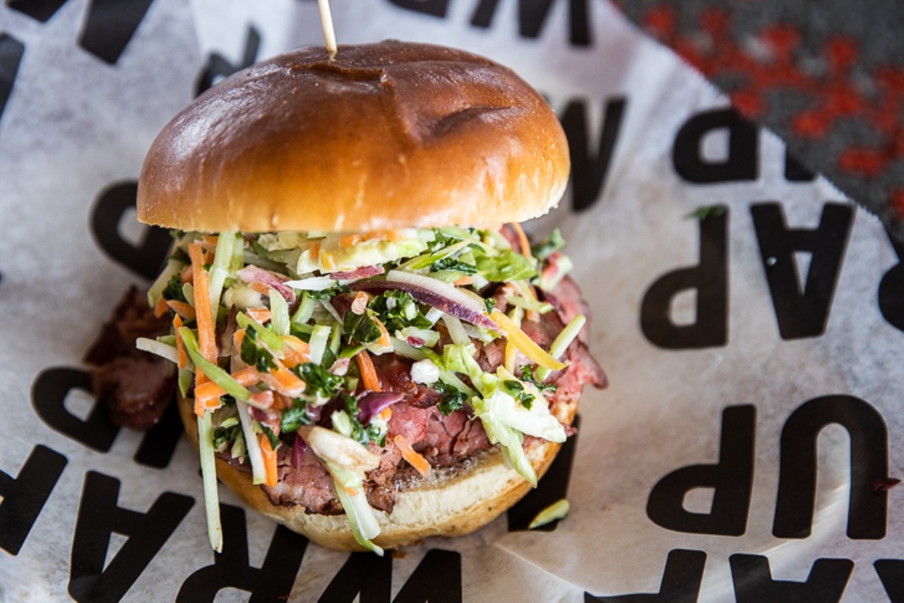 The smoked tri-tip sandwich with house-smoked sirloin and jalape&ntilde;o slaw, served on a brioche bun. Available in Mr. Red's Smokehouse &#151; Section 137.