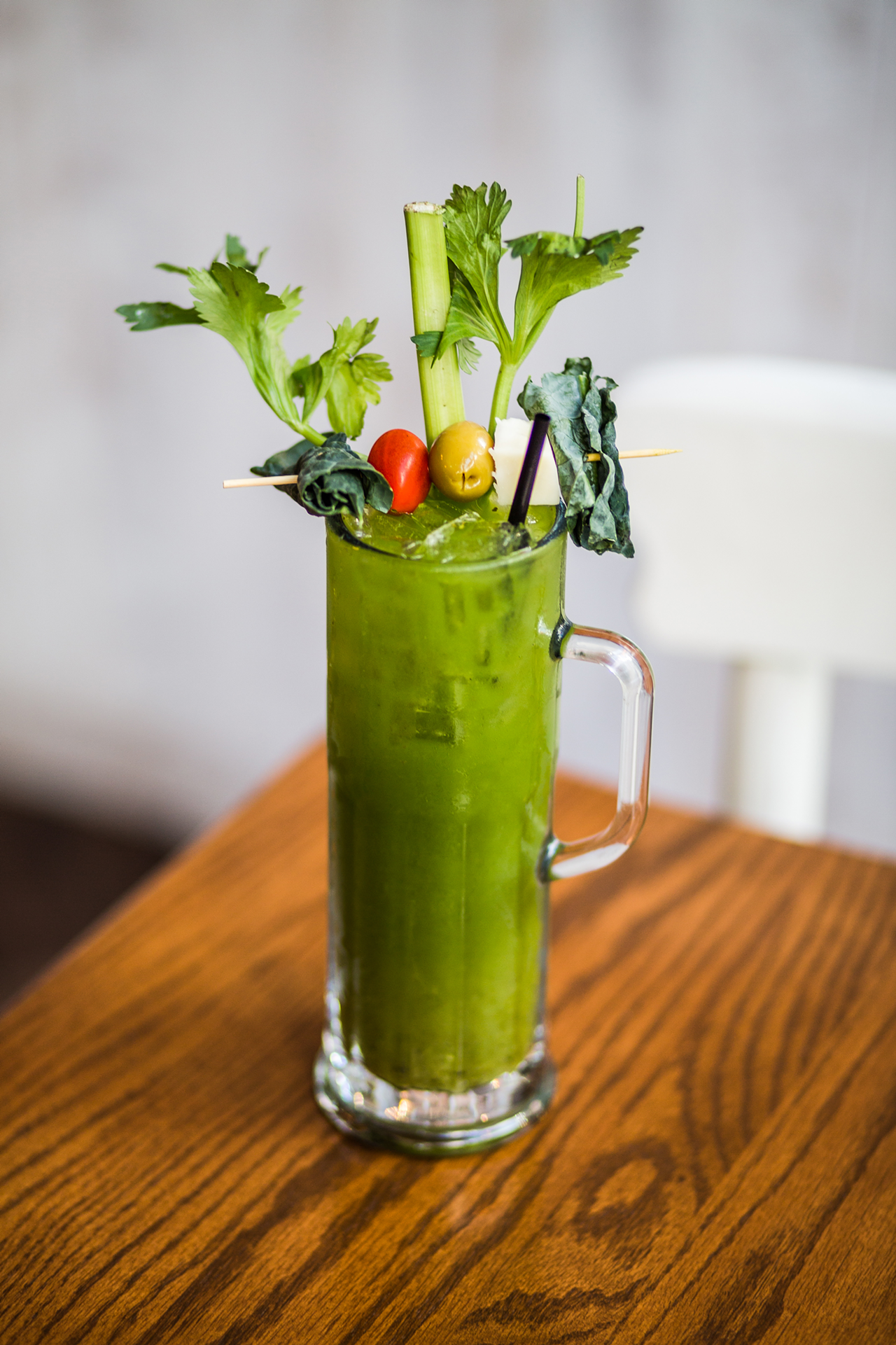 Maplewood Kitchen and Bar // Maplewood’s Roasted Tomatillo Bloody switches it up by going green. Tito’s vodka is blended with housemade roasted tomatillo bloody mary mix and house-pressed, earthy Super Green juice (spinach, pineapple, romaine, kale, parsley, celery), served with a garnish of kale, an olive, a cheese cube, tomato and celery. 525 Race St., Downtown, maplewoodkitchenandbar.com.