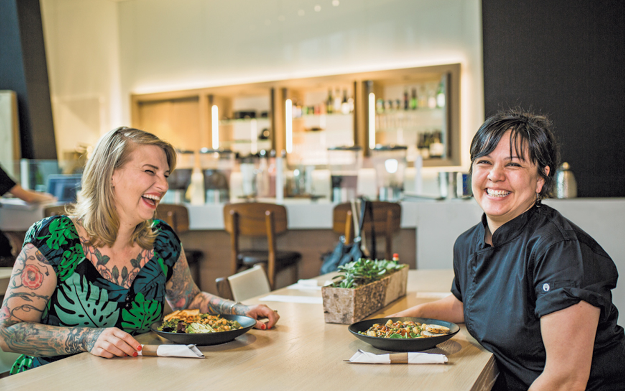 Molly Wellmann (left) and Lisa Kagen of Wellmann’s Brands expanded the café space in the Contemporary Arts Center to accommodate more food, more seating and a new bar.