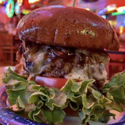 The Turf Club: The Fieri Burger4618 Eastern Ave., Mount LookoutAn 8-ounce ground chuck patty, topped with grilled onions, Swiss cheese and our famous burgundy wine mushroom sauce. Served on a toasted Sixteen Bricks bun.