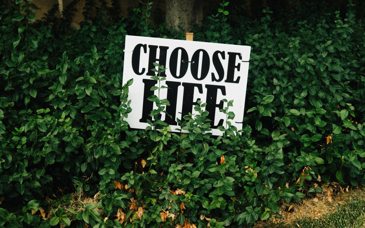 A "CHOOSE LIFE" sign sits outside St. William Church in Cincinnati's Price Hill neighborhood.