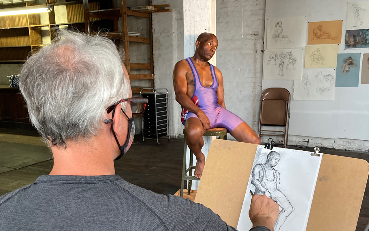 Artist David Mueller draws (clothed) figure model Dexter Harold Carpenter.