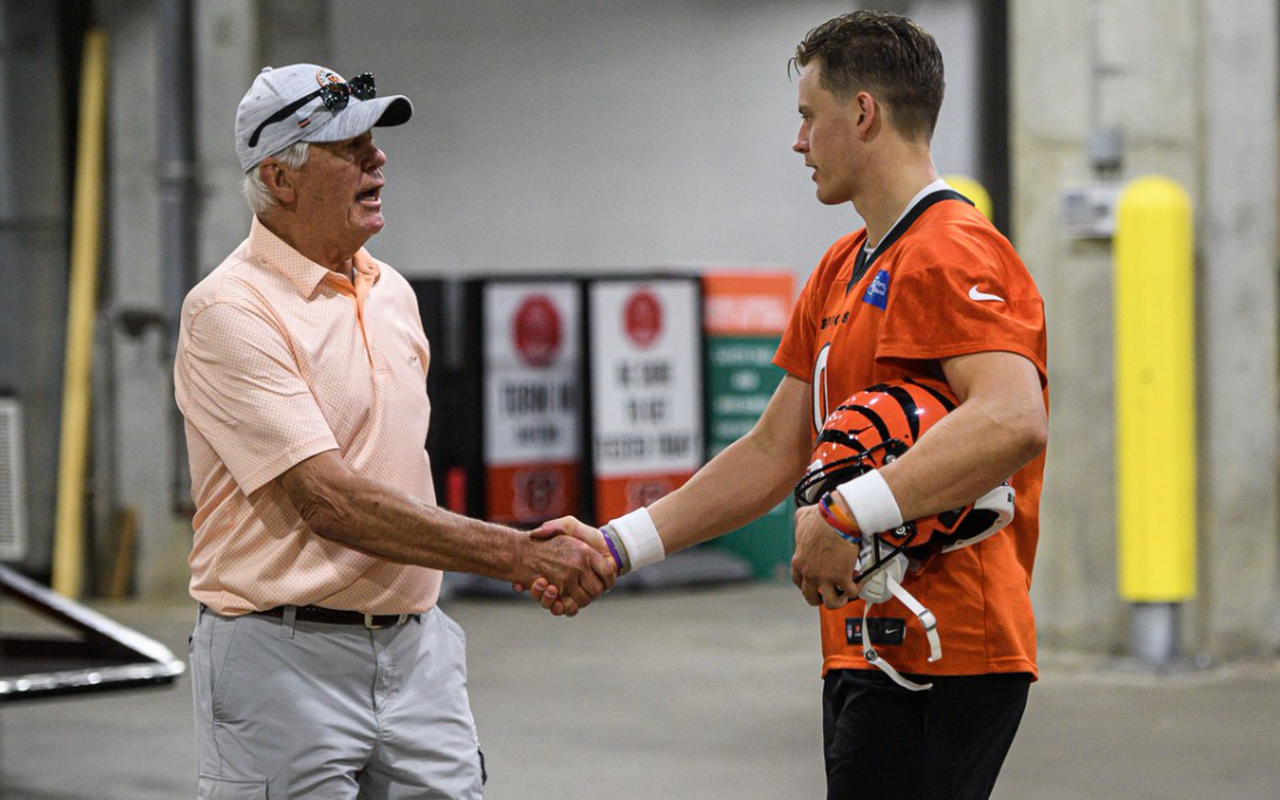Former Cincinnati Bengals quarterback Ken Anderson meets current quarterback Joe Burrow in June 2022.