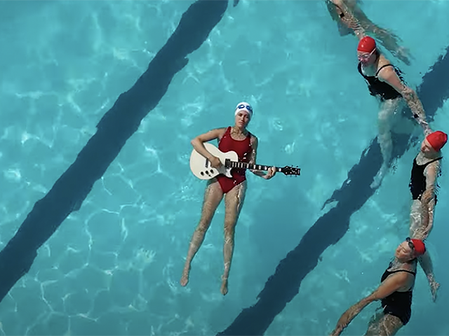 Mol Sullivan in her music video for "Deep End Dive."