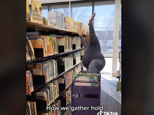 Library employee Kelwin Hester shows off his moves for the Cincinnati & Hamilton County Public Library's TikTok page.