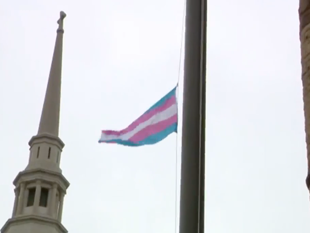 The transgender pride flag is raised at Cincinnati City Hall on March 31, 2022.