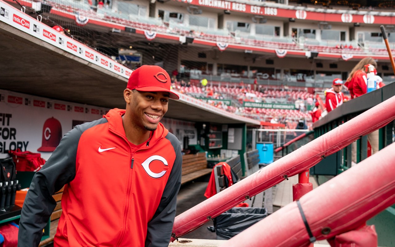 Cincinnati Reds pitcher Hunter Greene is photographed in the dugout at Great American Ball Park on April 12, 2022.