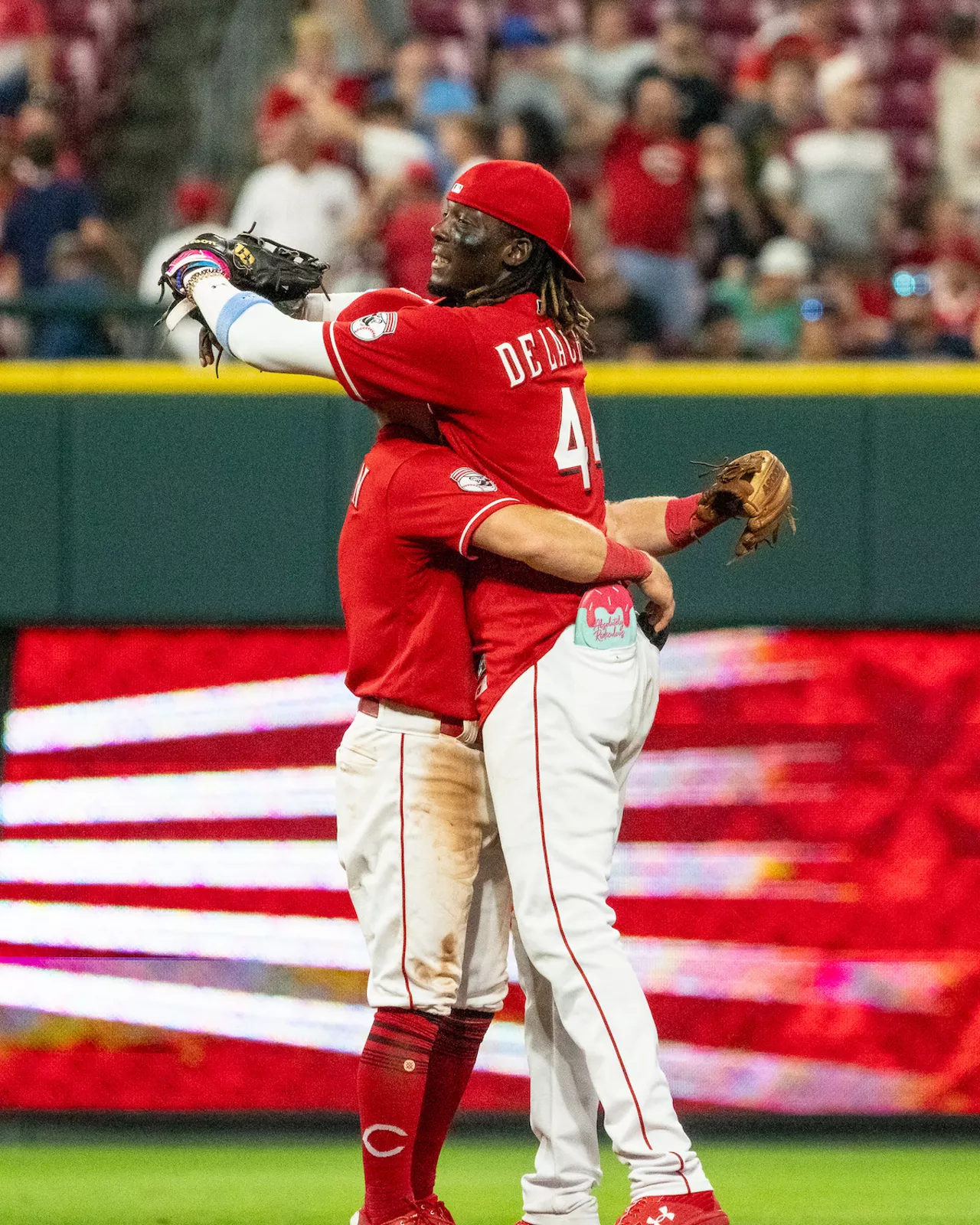 Cincinnati Reds' Spencer Steer (12) celebrates with Cincinnati