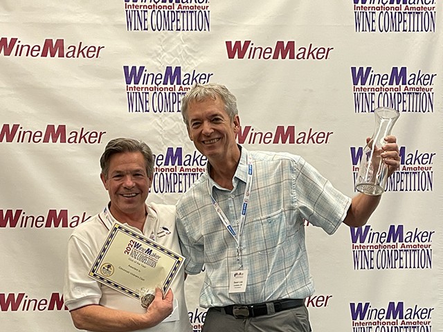 Cincinnati Vintner's Club member Joe Lauber (left) and CVC President Daniel Cobb (right) receiving Winemaker Magazine's Club of the Year award.