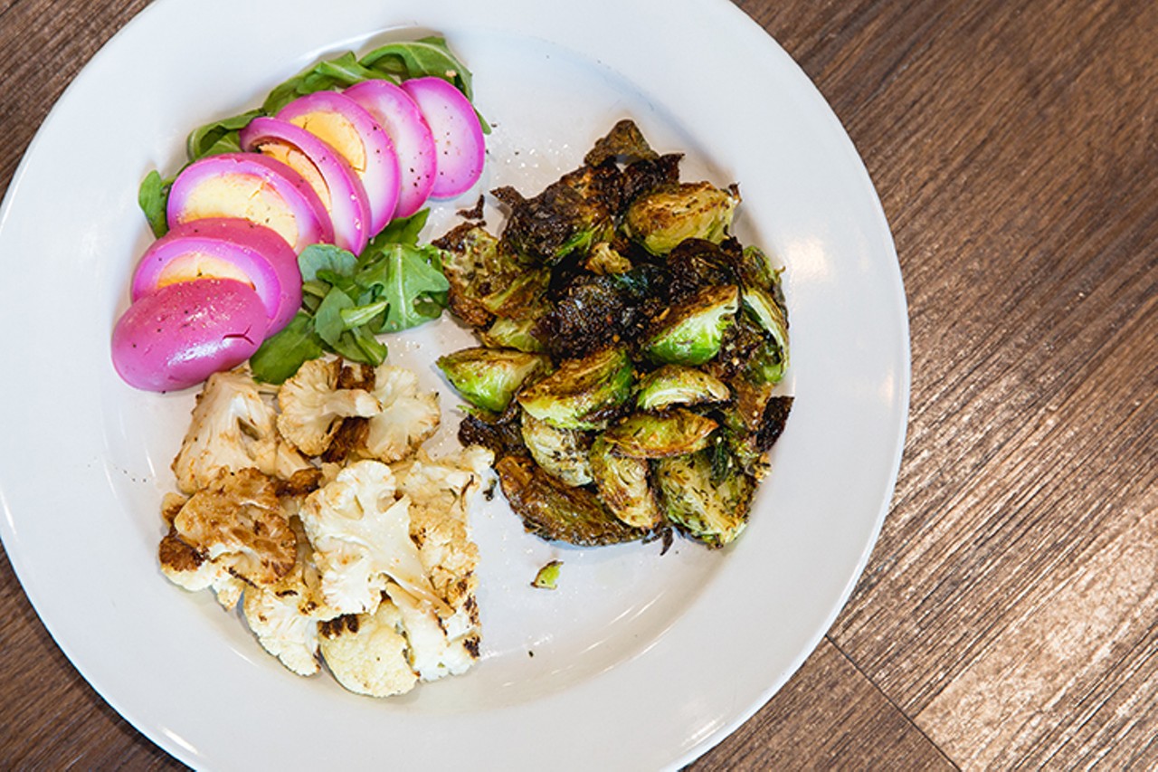 The sides rotate daily, included here are the Brussels Sprouts, roasted cauliflower and pickled eggs
