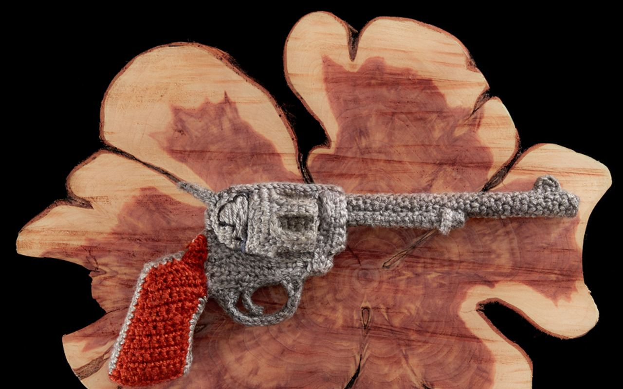 Crocheted “Peacemaker” in A Loaded Conversation