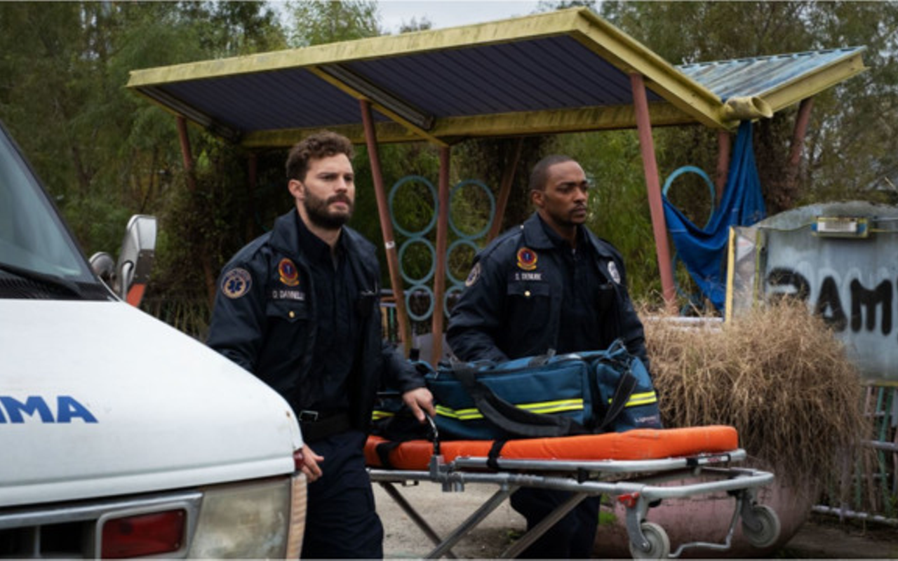 Paramedics Dennis (Jamie Dornan), left, and Steve (Anthony Mackie) take care of New Orleans' wounded, and each other, but they aren't prepared for where Synchronic will take them.
