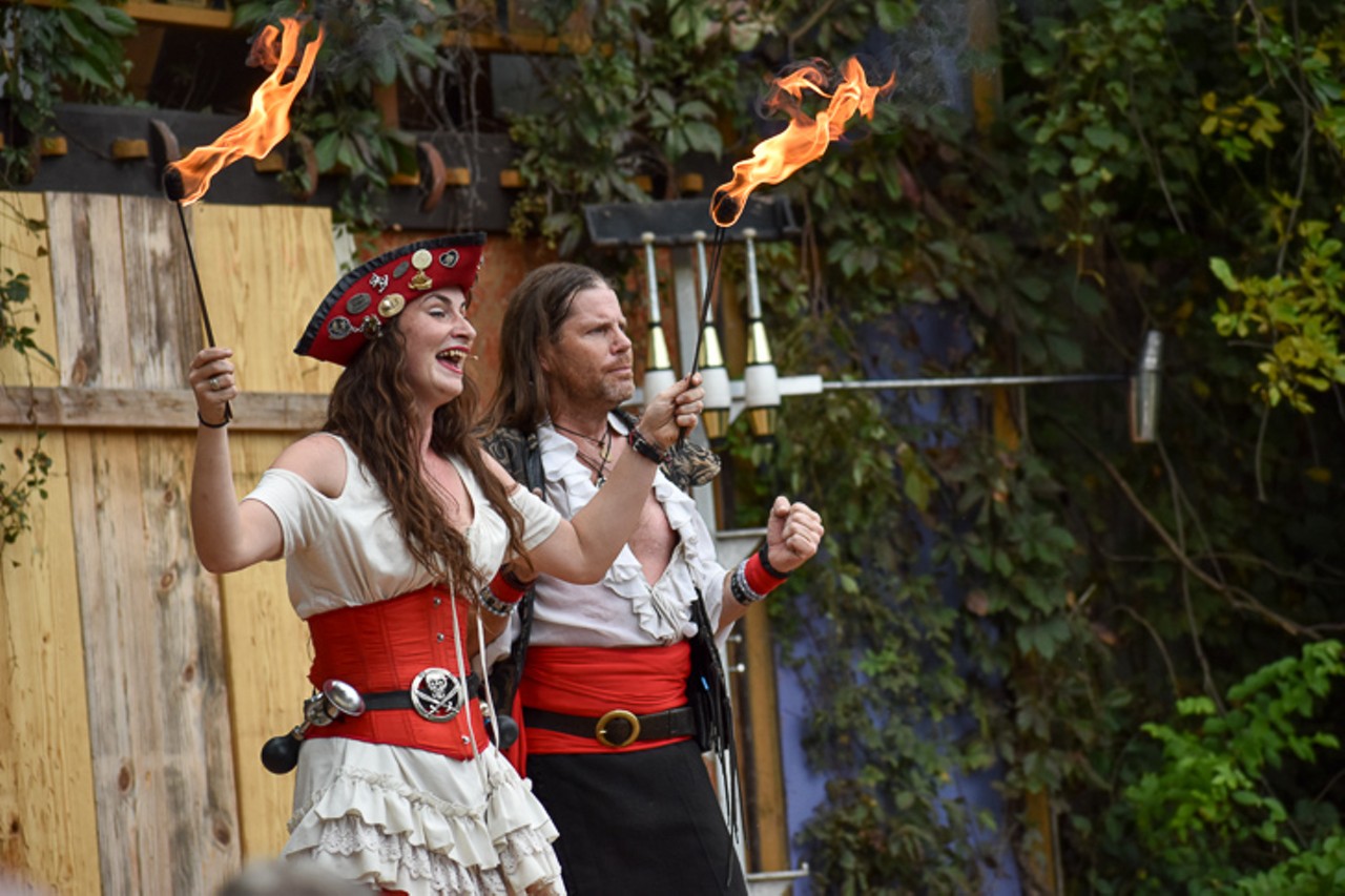 Bonnie Lass and Shantyman performing their comedy and fire-eating show