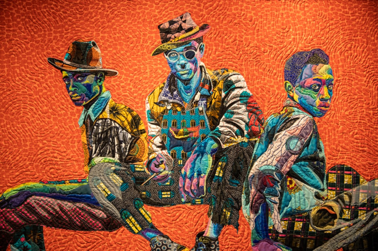 Bisa Butler's "Three Kings." Colorful and vibrant, Butler uses the traditional form of a quilt to weave historical photographs into a new context.