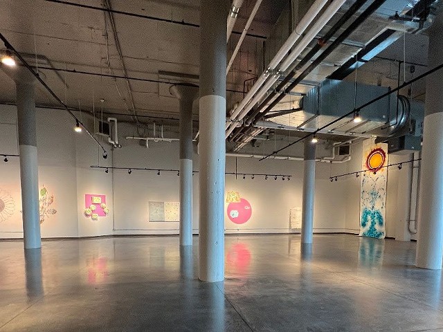 An installation view of  Art for Food  at The Summit Hotel Gallery.