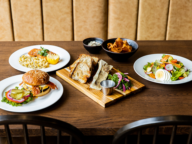 A selection of dishes from Goose & Elder, including the Royale Goose burger, bone marrow and toast and chicken schnitzel