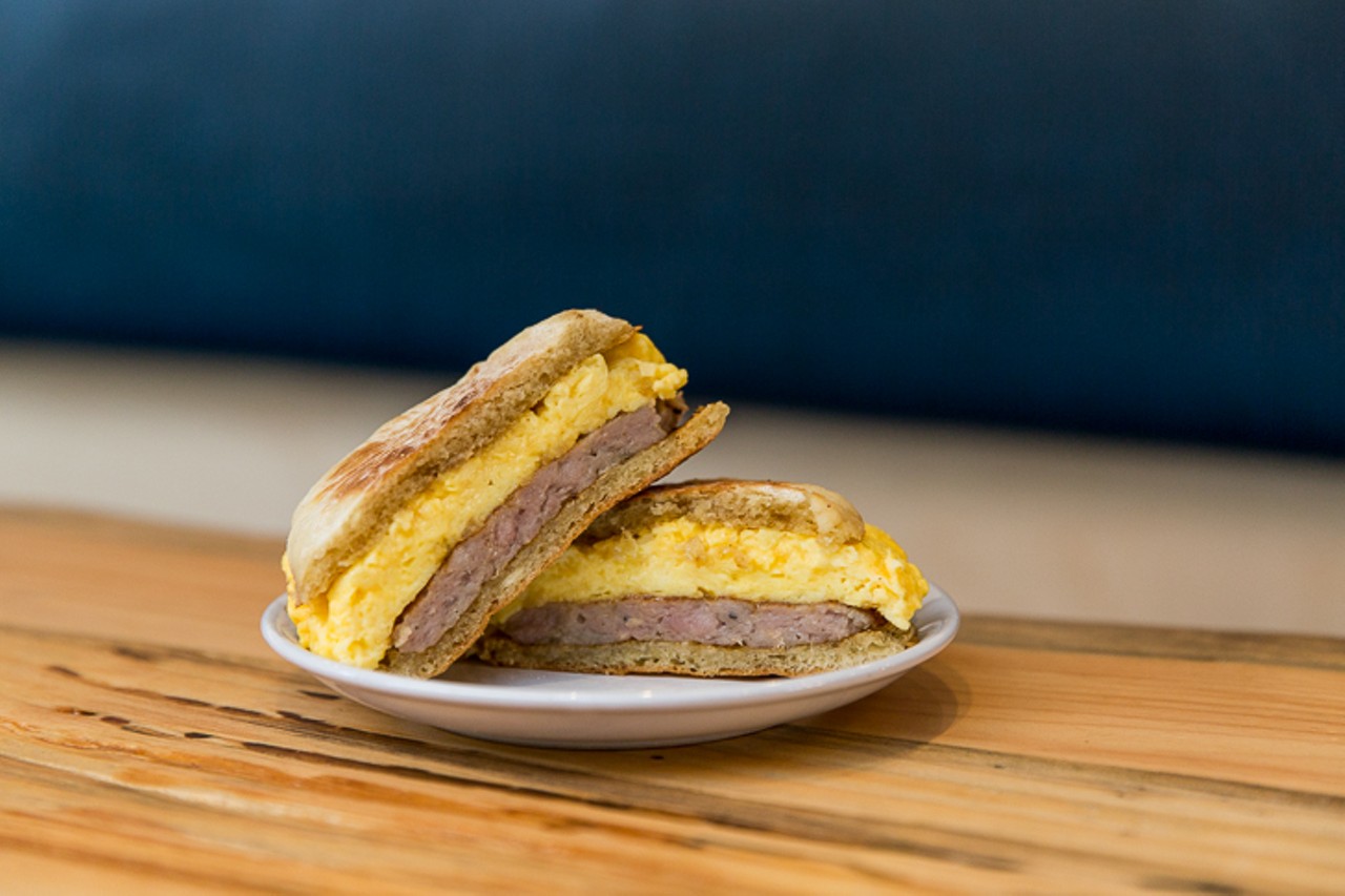 Breakfast sandwich on a housemade English muffin with ham, maple sausage or bacon and cheesy eggs ($4.50)