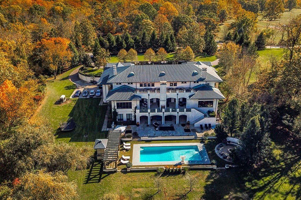 5775 Drake Rd, Indian Hill
$6,900,000 | 6 bd/8.5+ ba | 15,041 sq. ft. | Year Built: 2004
"Escape to an Italian Villa! Unique & breathtaking. Imported top of the line building materials. A hidden gem. Open flr plan, dream kitchen, theater, & elevator. Outdoor oasis w/pool, terrace, pizza oven, fire pit, screened porch, & FP. LL w/exercise & massage room, recreation area. Heated stone flooring throughout. All B/R w/en suite baths. Six car gar. Unbelievable!"