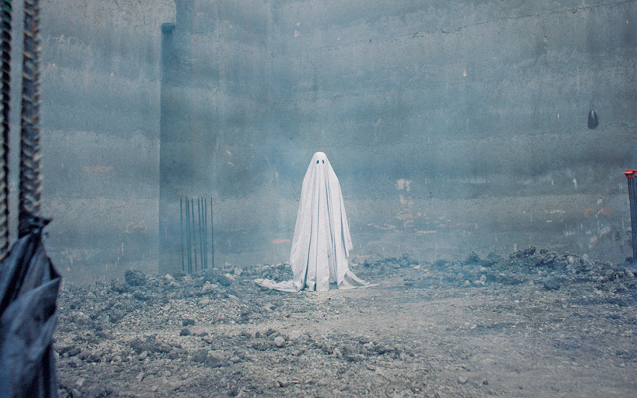 Casey Affleck plays the lonely ghost at the center of the film.