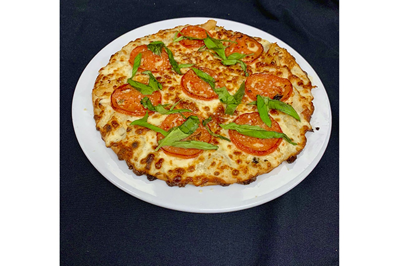 Clubhouse Sports Grille
8188 Princeton Glendale Road, West Chester
10? Margarita Chicken Pizza
Homemade alfredo sauce topped with shredded chicken, marinated roma tomatoes, mozzarella cheese, parmesan cheese and fresh basil
Photo: Provided