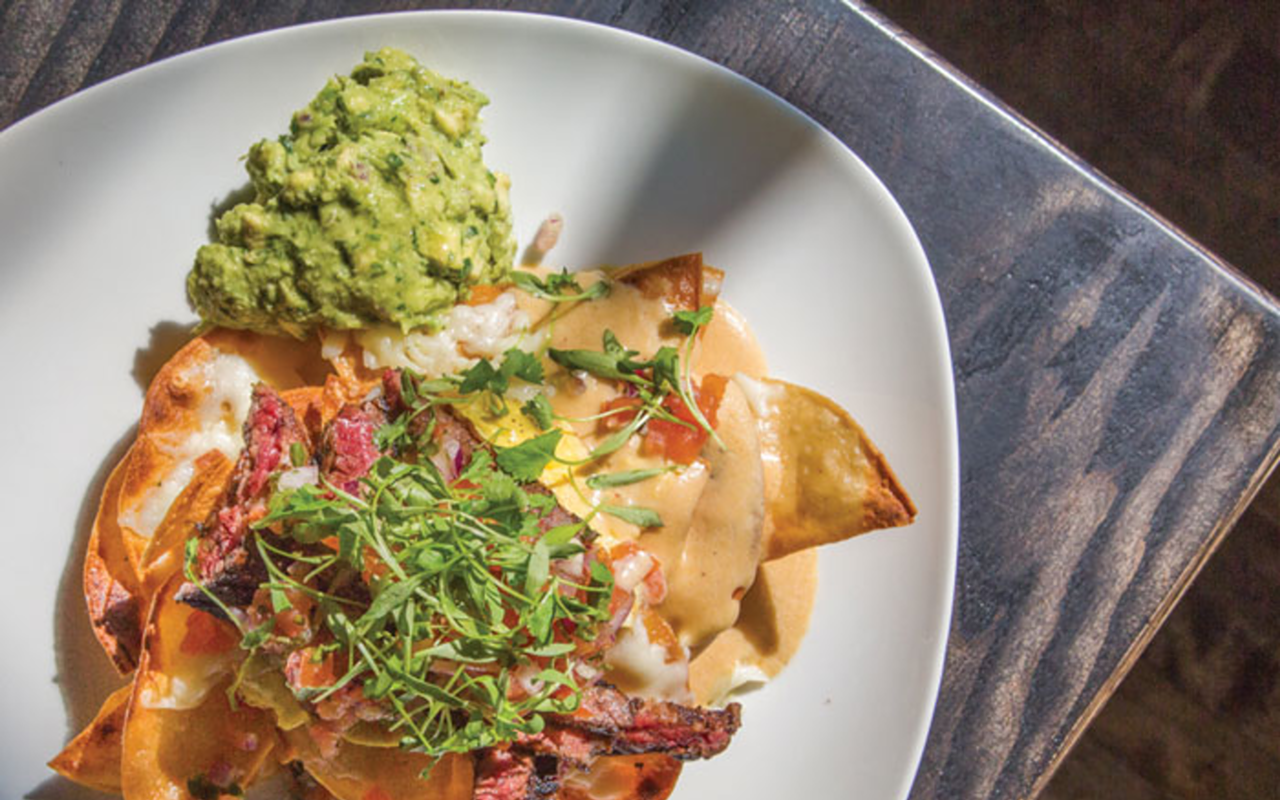 Egg nachos are real and they exist on E O Kitchen’s new brunch menu, along with other sweet and savory Asian-Latin dishes.