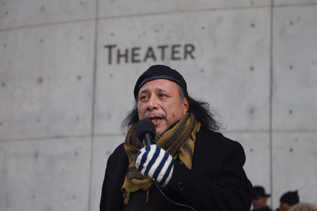 Jheri Neri of the Greater Cincinnati Native American Coalition gives an opening prayer outside the National Underground Railroad Freedom Center