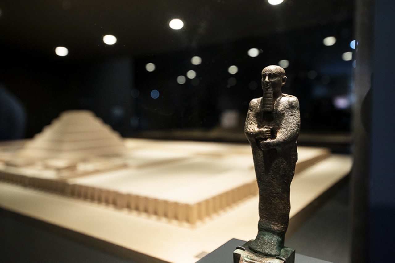 Figurines sit on either side of King Djoser's Complex replica