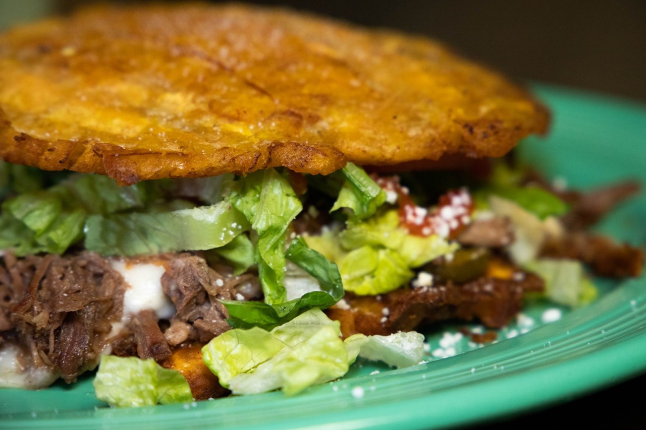 Patacones (plantain sandwich) with meat