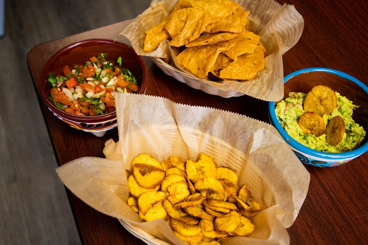 A spread of freshly-made chips and dips