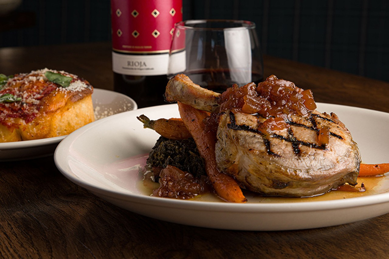12 oz. Frenched pork chop with braised kale, carrots and mostarda