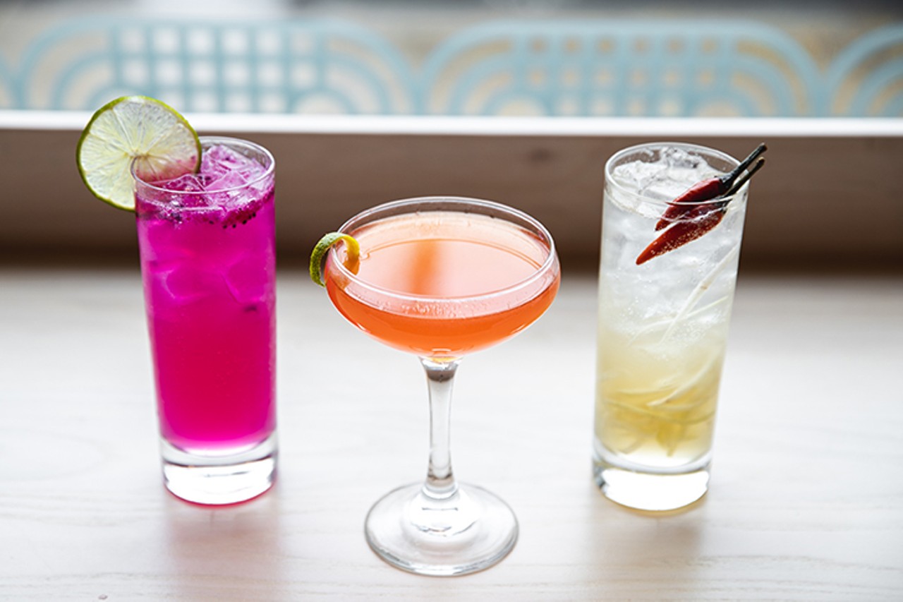 Don&#146;t overlook their playful, Asian-accented cocktail list. Pictured (L-R) is the Cliff Diver ($11), Thuoc Bac ($8) and the Tigers Love Peppers ($10).