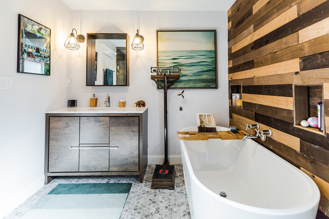 ​"The scale came from the Burlington Antique Fair.​ It is off by 20 pounds or so...and not in the right direction. My favorite part of the bathroom is the really cool knobs and bathtub hardware." — Tim