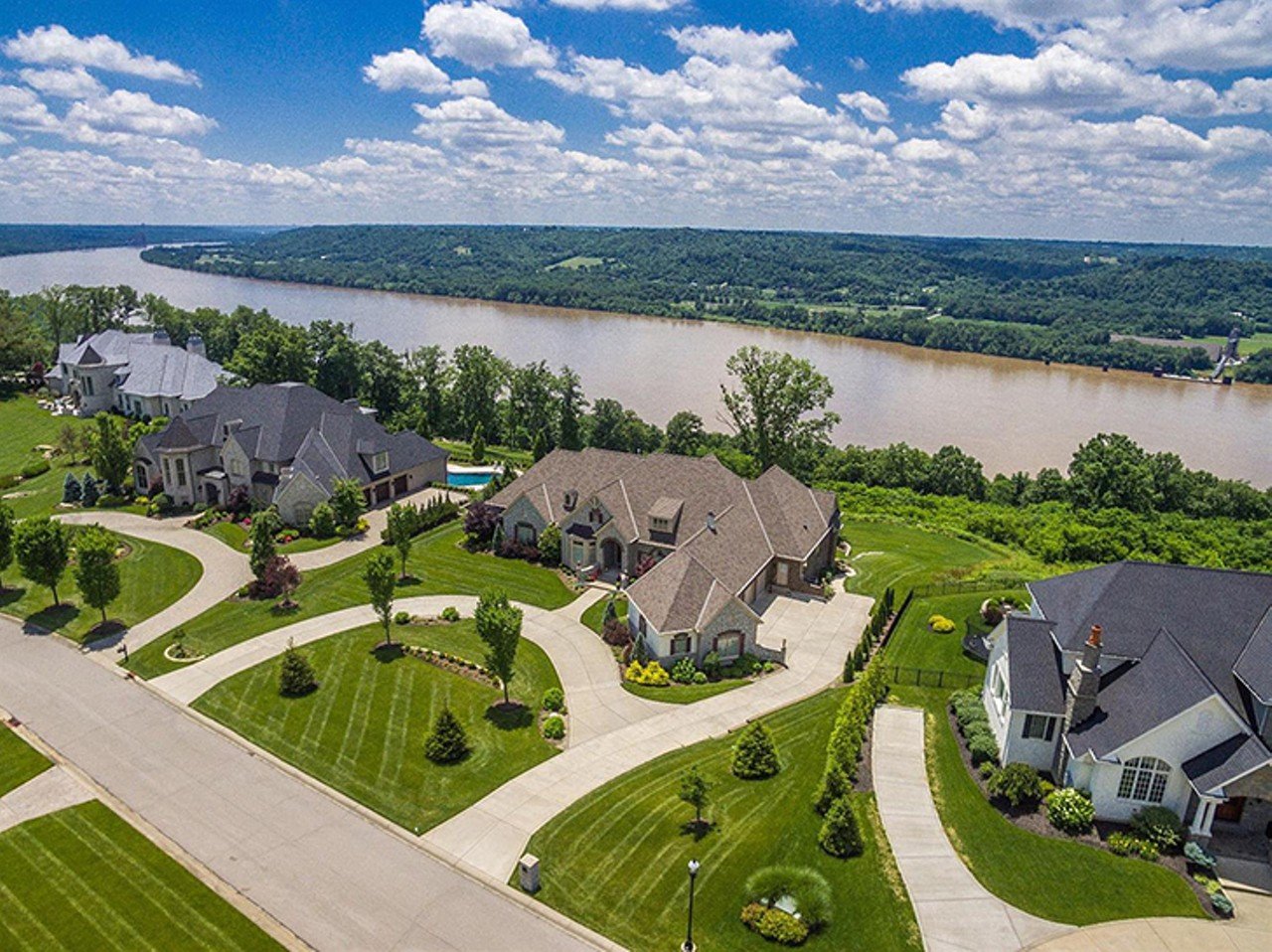 7935 Ayers Road, Anderson Township
$2,945,000 | 4 bd/ 7 ba | 7,855 sq. ft. | Year Built: 2014 
This enormous East Side ranch is situated on a scenic plot of land overlooking the Ohio River. With an open floor plan and large windows throughout the home, the light-filled space is perfect for entertaining.