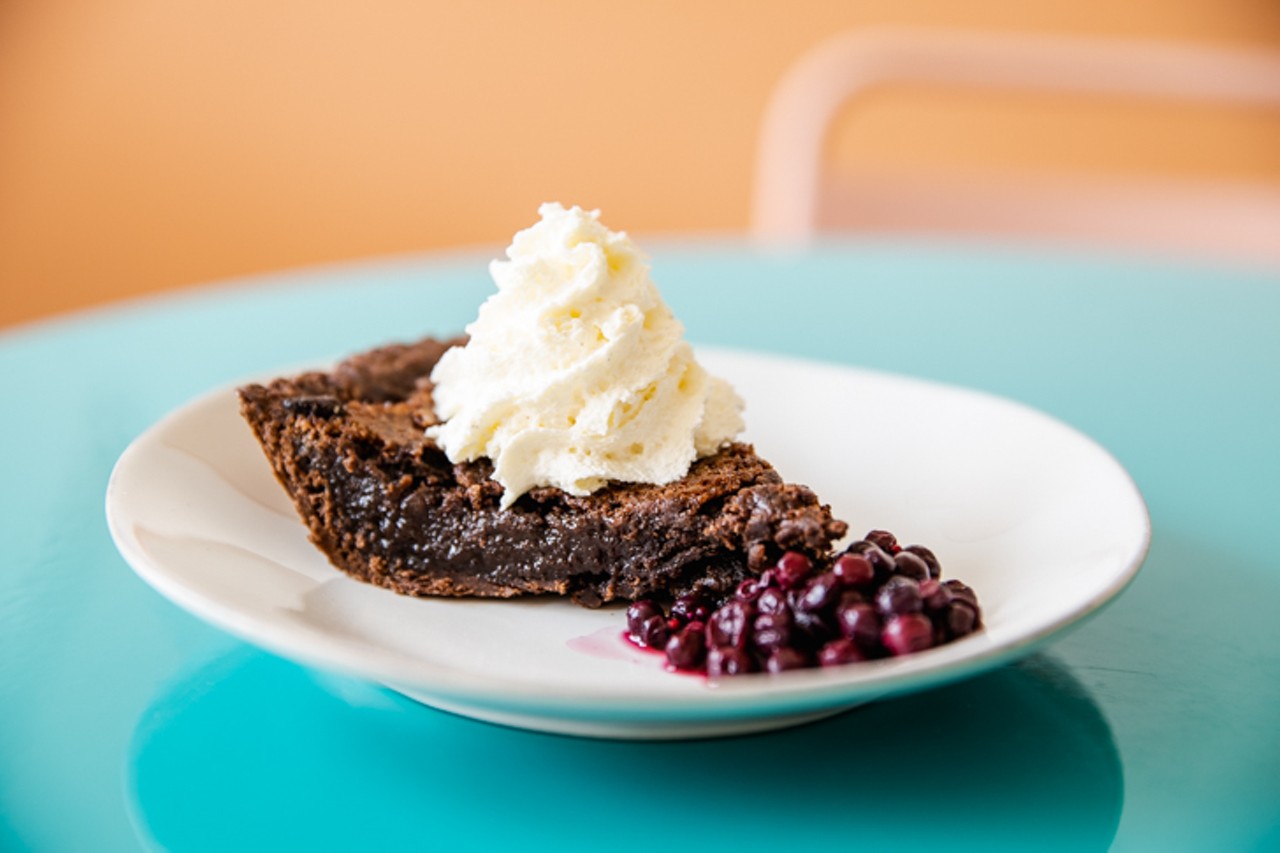 Chocolate Chess pie with blueberries and whipped cream