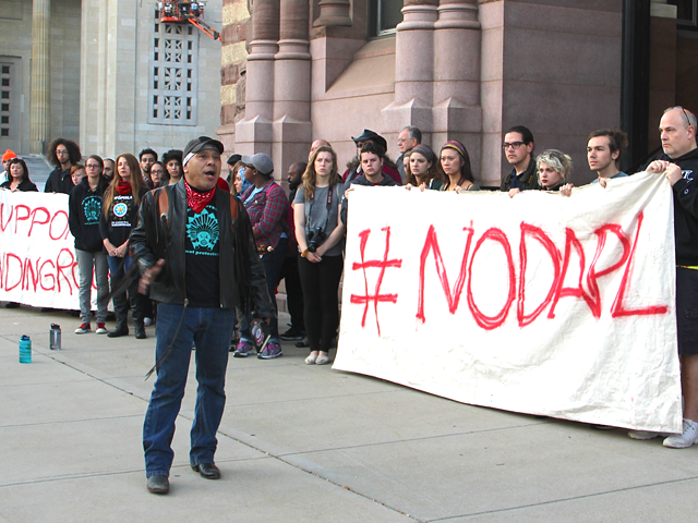 Local Native American activist and Cincinnati Human Relations Commission member Jheri Neri speaks to protesters outside Cincinnati City Hall during a demonstration against the Dakota Access Pipeline.